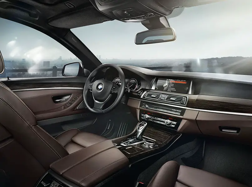 BMW 5 Series 520i Luxury Line interior front cross view