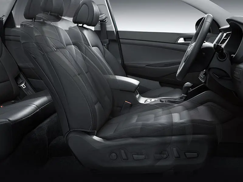Hyundai Tucson Highlander interior adjustable front seat view